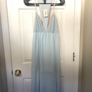 Lace V-neck floor length dress.